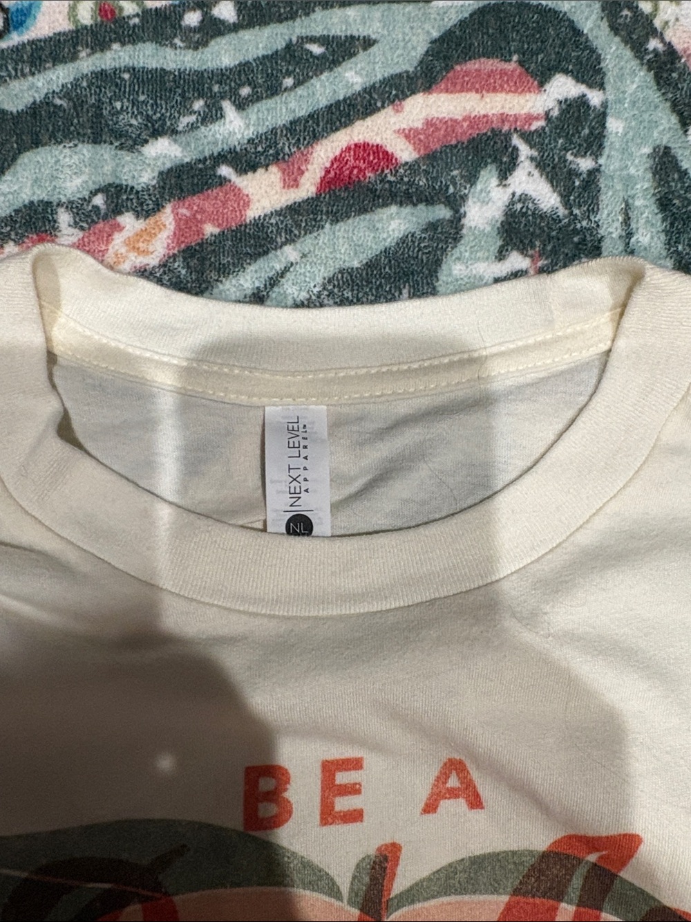 Next Level Apparel Cream Tee with Orange Retro Script - Picture 4 of 4